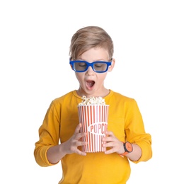 Cute boy in 3D glasses with popcorn bucket isolated on white