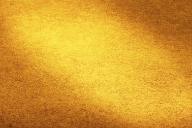 Image of Golden textured surface as background, closeup view