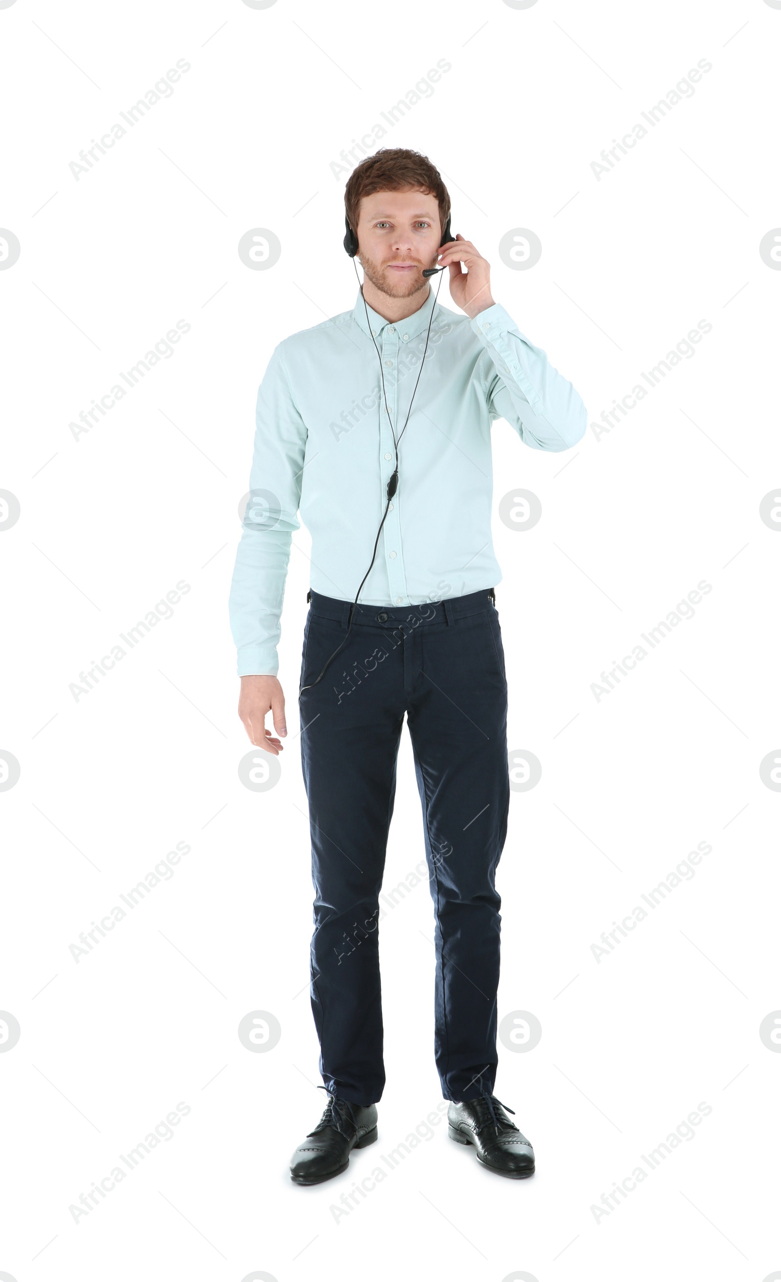 Photo of Male technical support operator with headset isolated on white