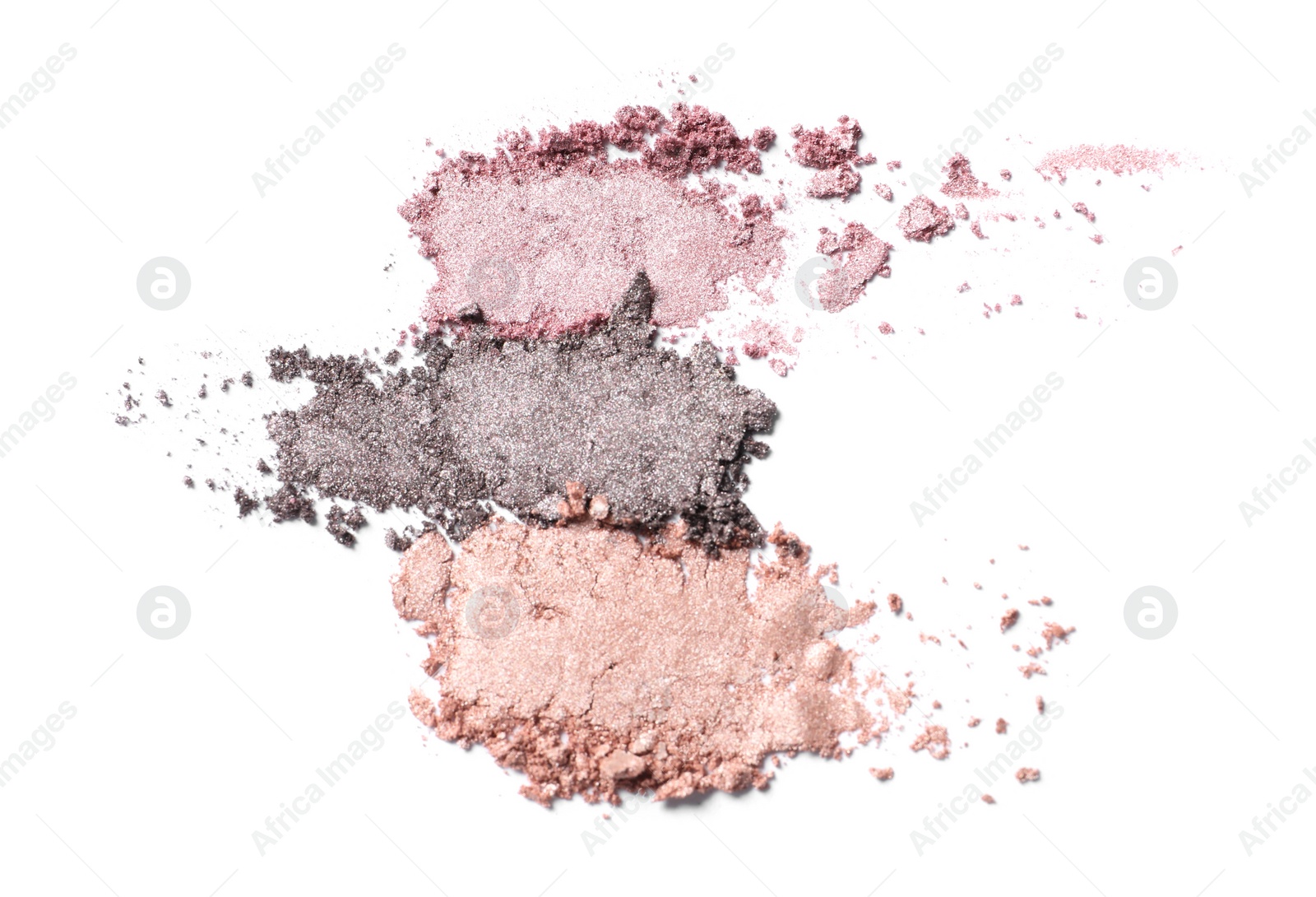 Photo of Crushed eye shadows on white background. Professional makeup product