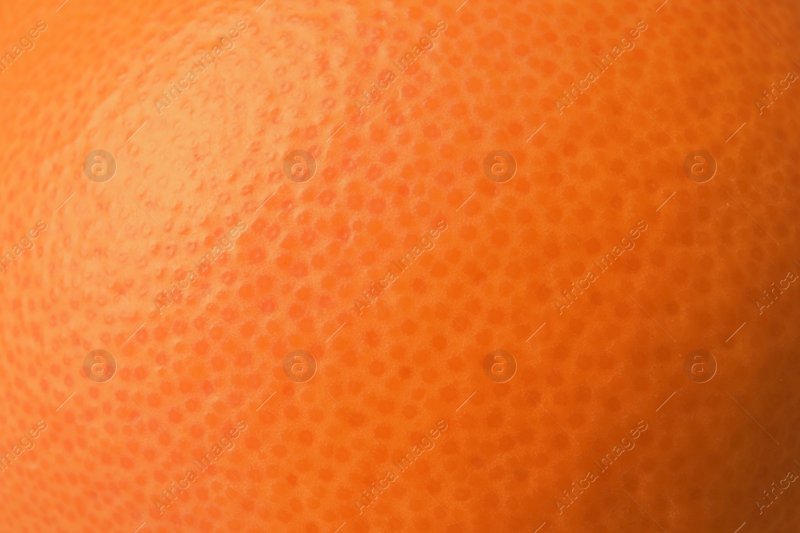 Photo of Ripe orange as background, closeup. Citrus fruit