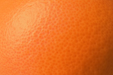 Photo of Ripe orange as background, closeup. Citrus fruit