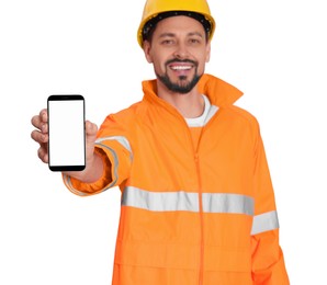 Man in reflective uniform with phone on white background