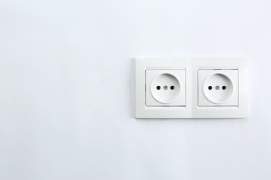 Photo of Power sockets on white background. Electrician's equipment