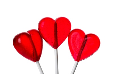 Photo of Sweet heart shaped lollipops on white background. Valentine's day celebration