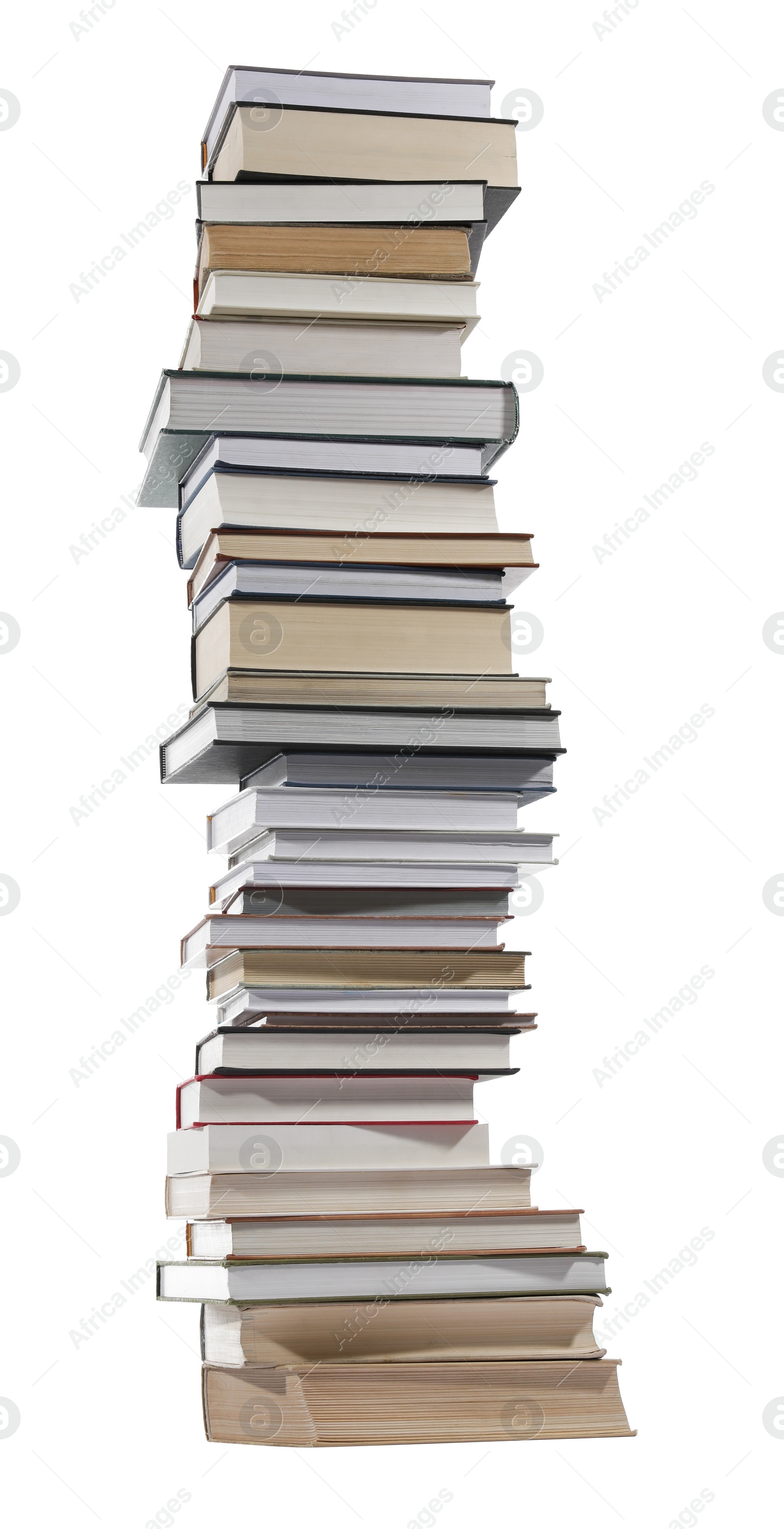 Photo of High stack of many different books isolated on white