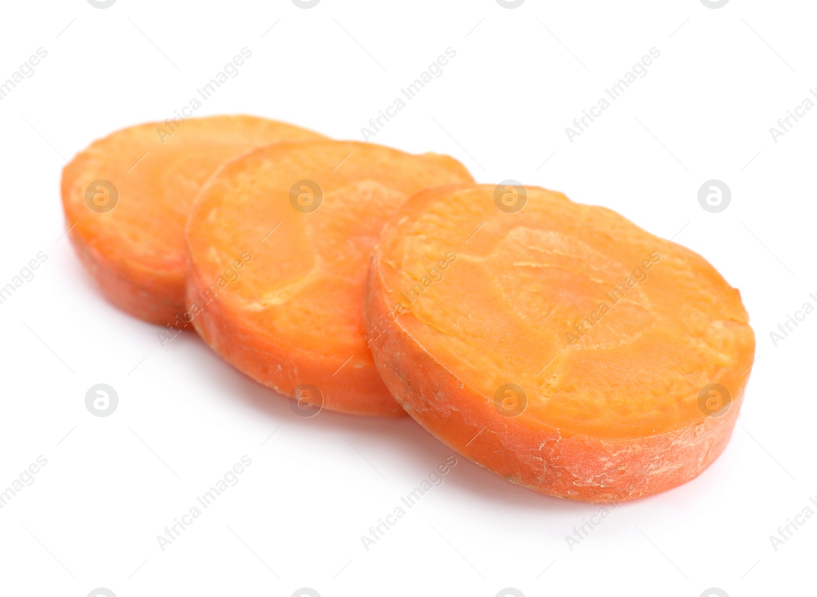 Photo of Slices of fresh ripe carrot on white background