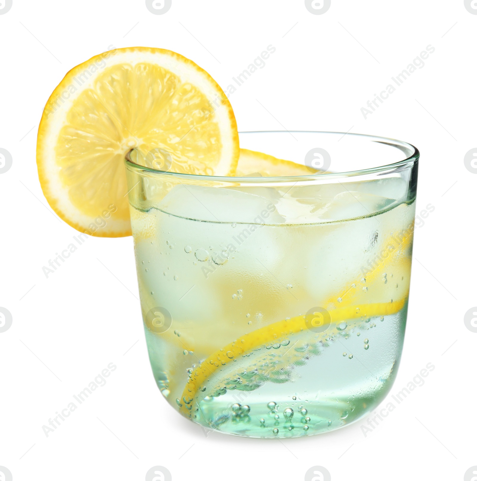 Photo of Soda water with lemon slices and ice cubes isolated on white