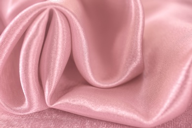 Photo of Texture of beautiful rose silk as background