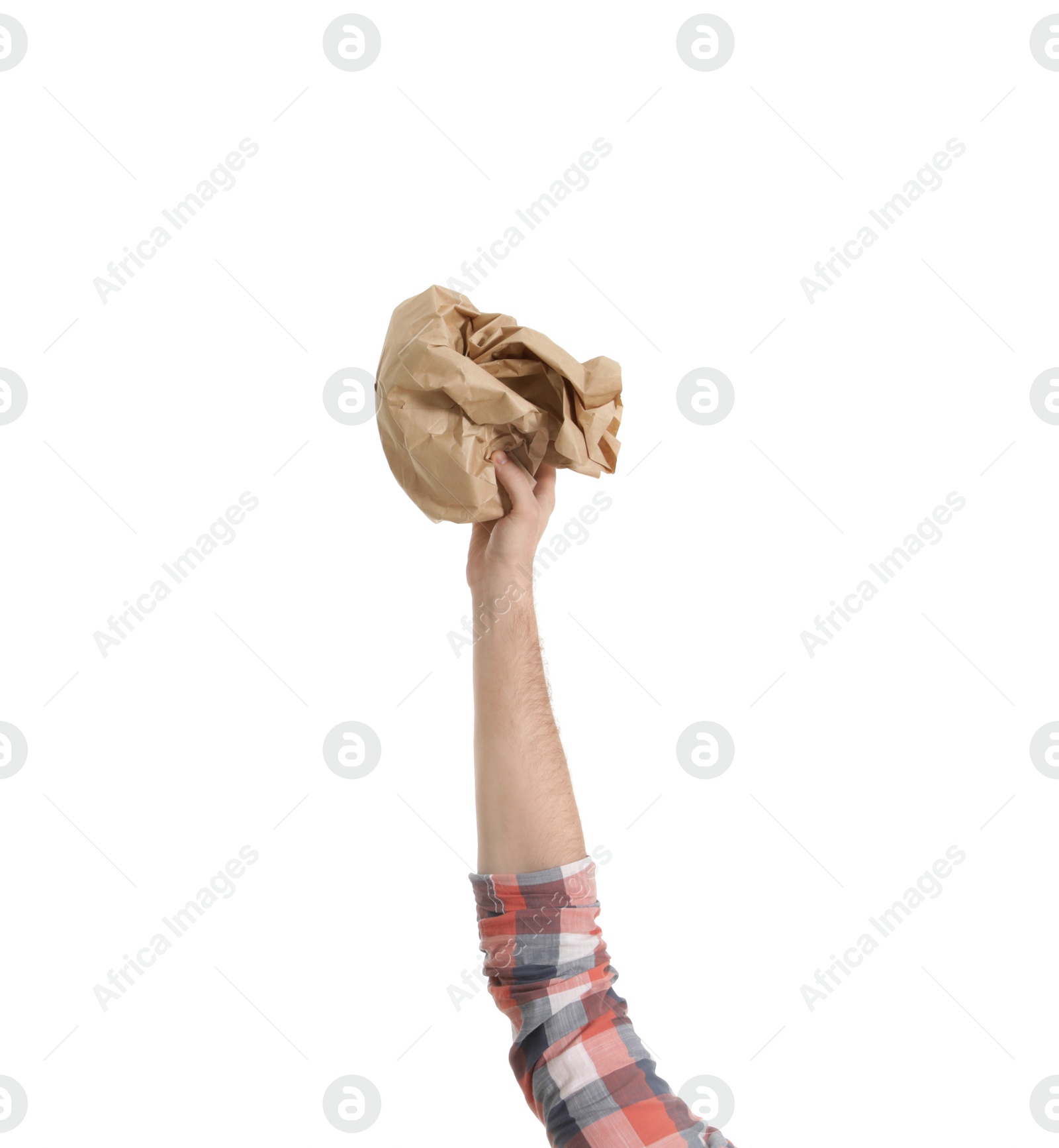 Photo of Man holding crumpled paper bag isolated on white, closeup. Waste recycling concept