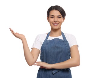 Young woman in blue apron on white background