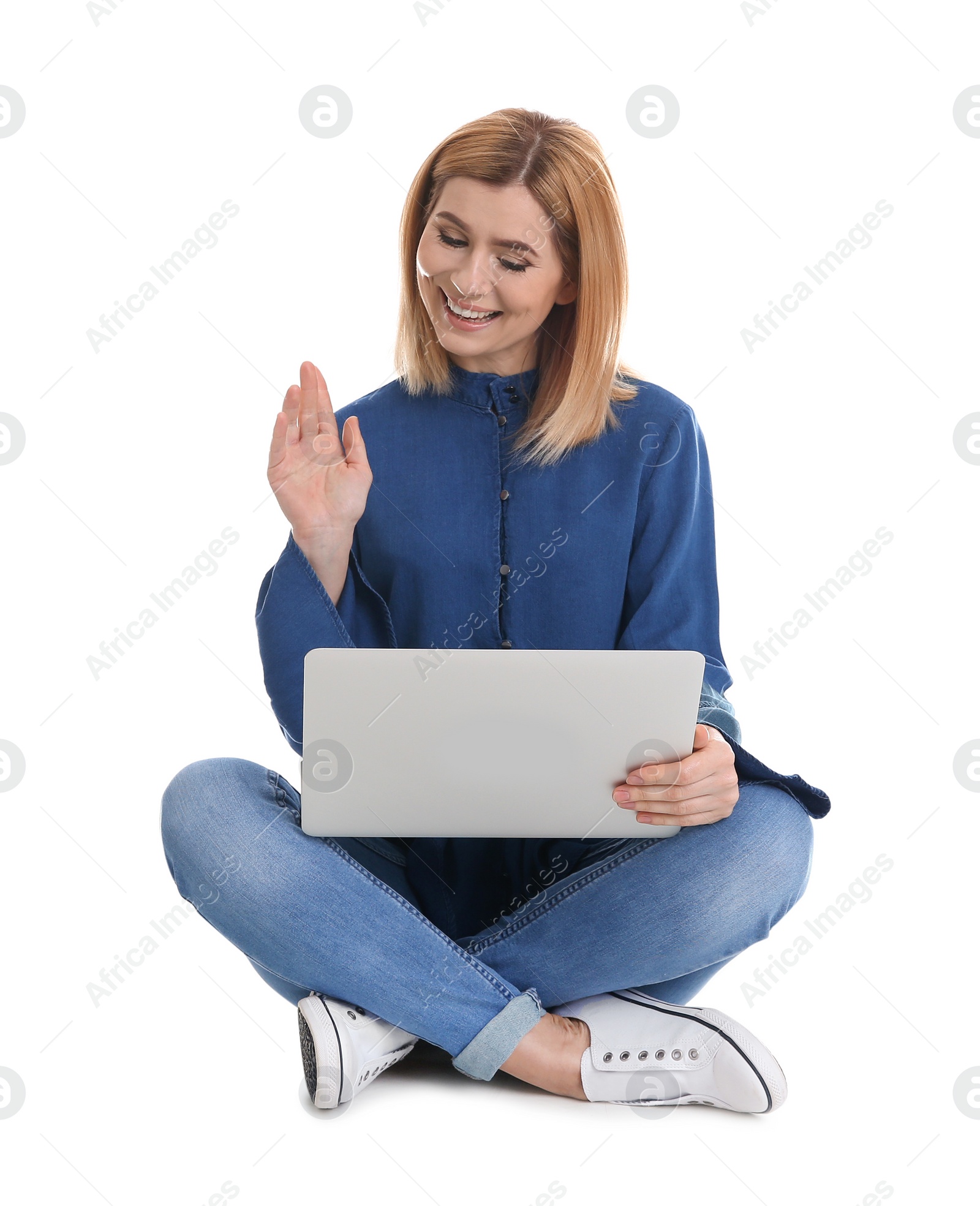 Photo of Woman using laptop for video chat isolated on white