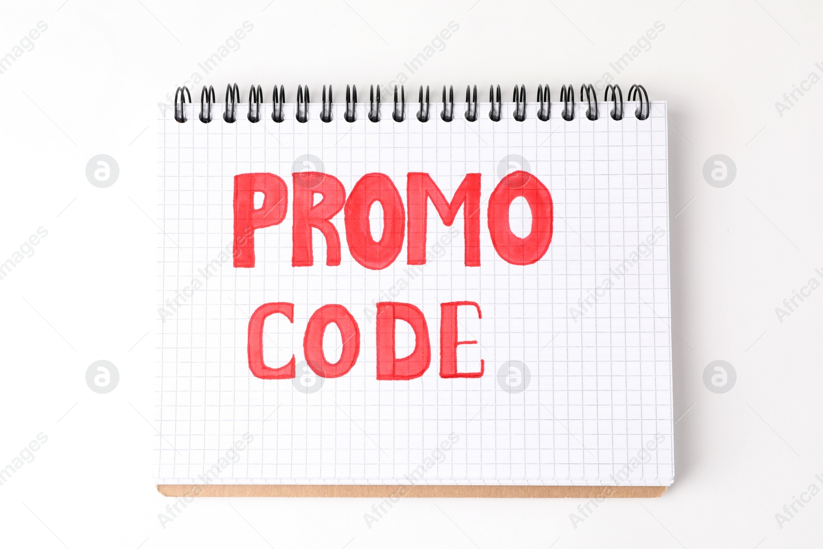 Photo of Notebook with words Promo Code on white background, top view