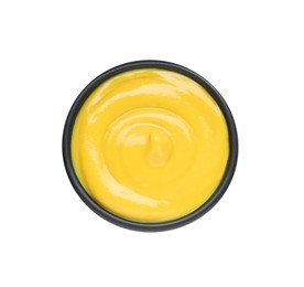 Photo of Bowl with delicious mustard on white background, top view