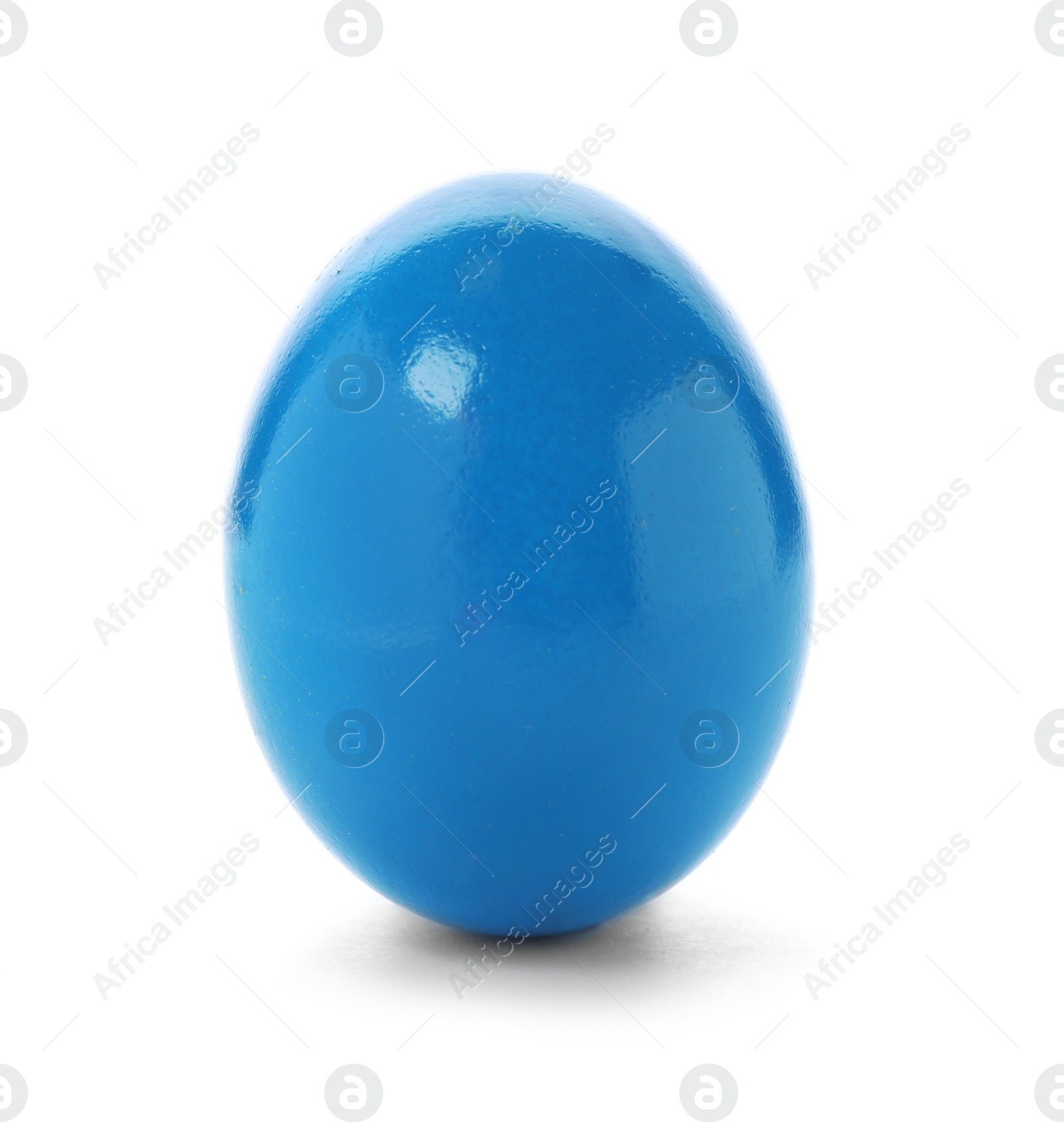 Photo of Dyed Easter egg on white background. Festive tradition