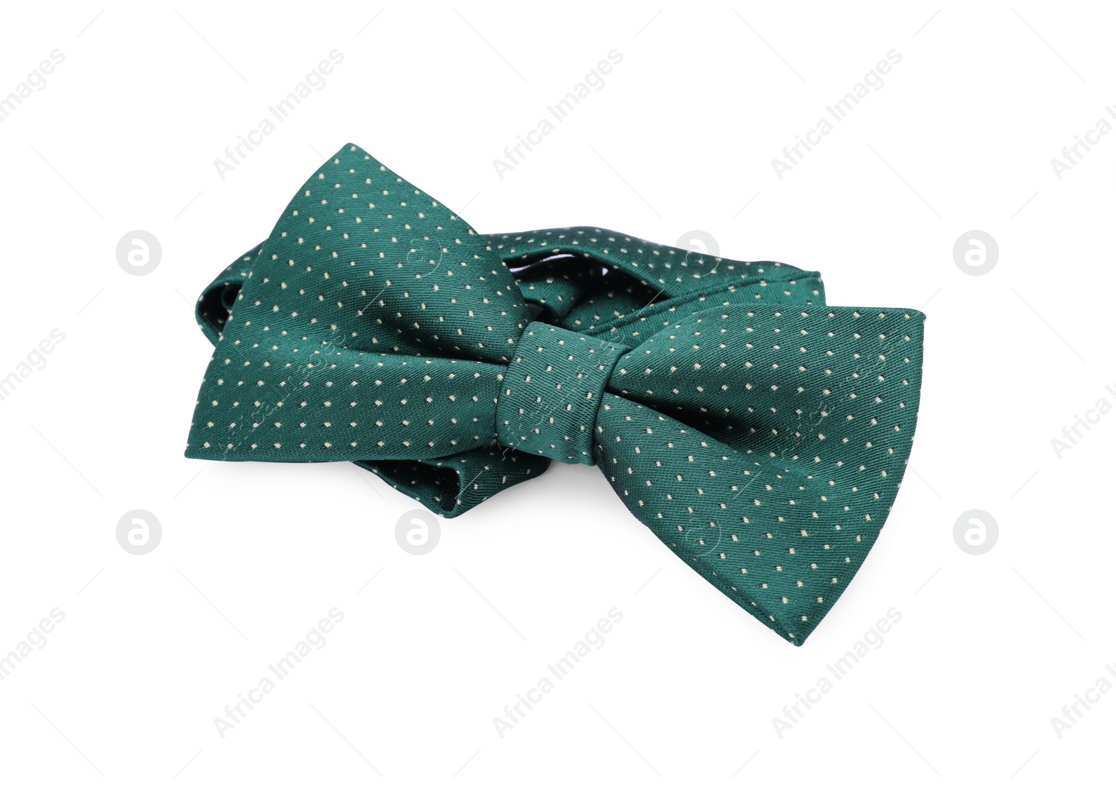 Photo of Stylish green bow tie with polka dot pattern on white background