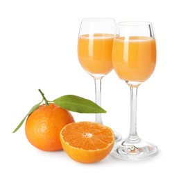Photo of Tasty tangerine liqueur in glasses and fresh citrus fruits isolated on white
