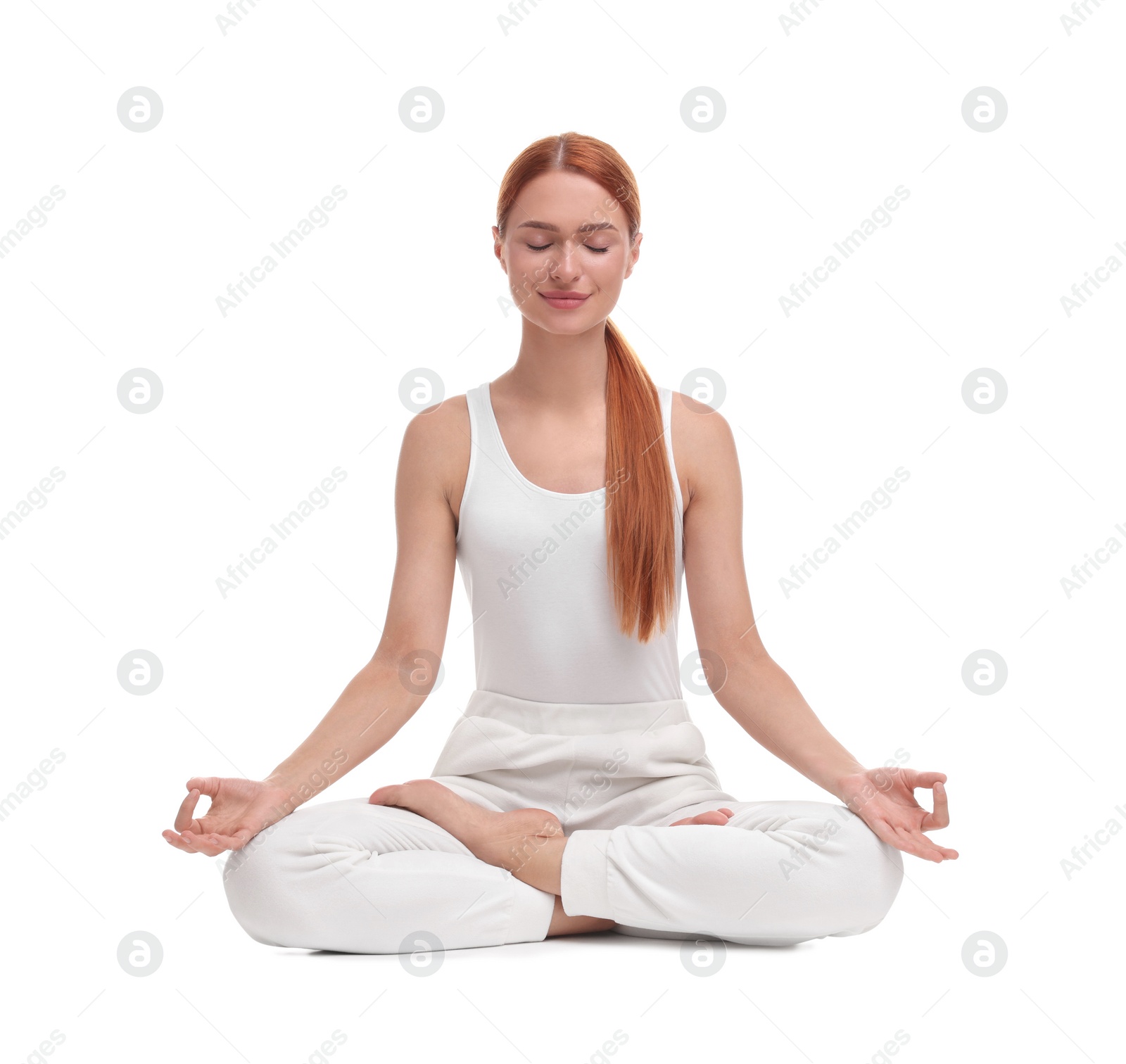 Photo of Beautiful young woman practicing yoga on white background. Lotus pose