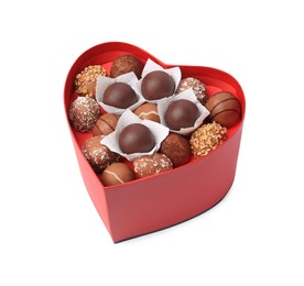 Photo of Heart shaped box with delicious chocolate candies isolated on white