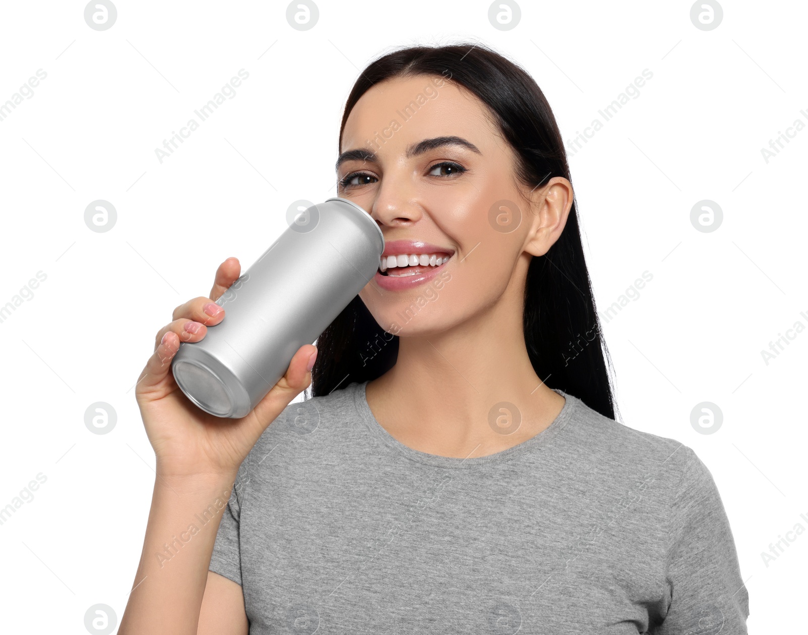 Photo of Beautiful happy woman drinking from beverage can on white background
