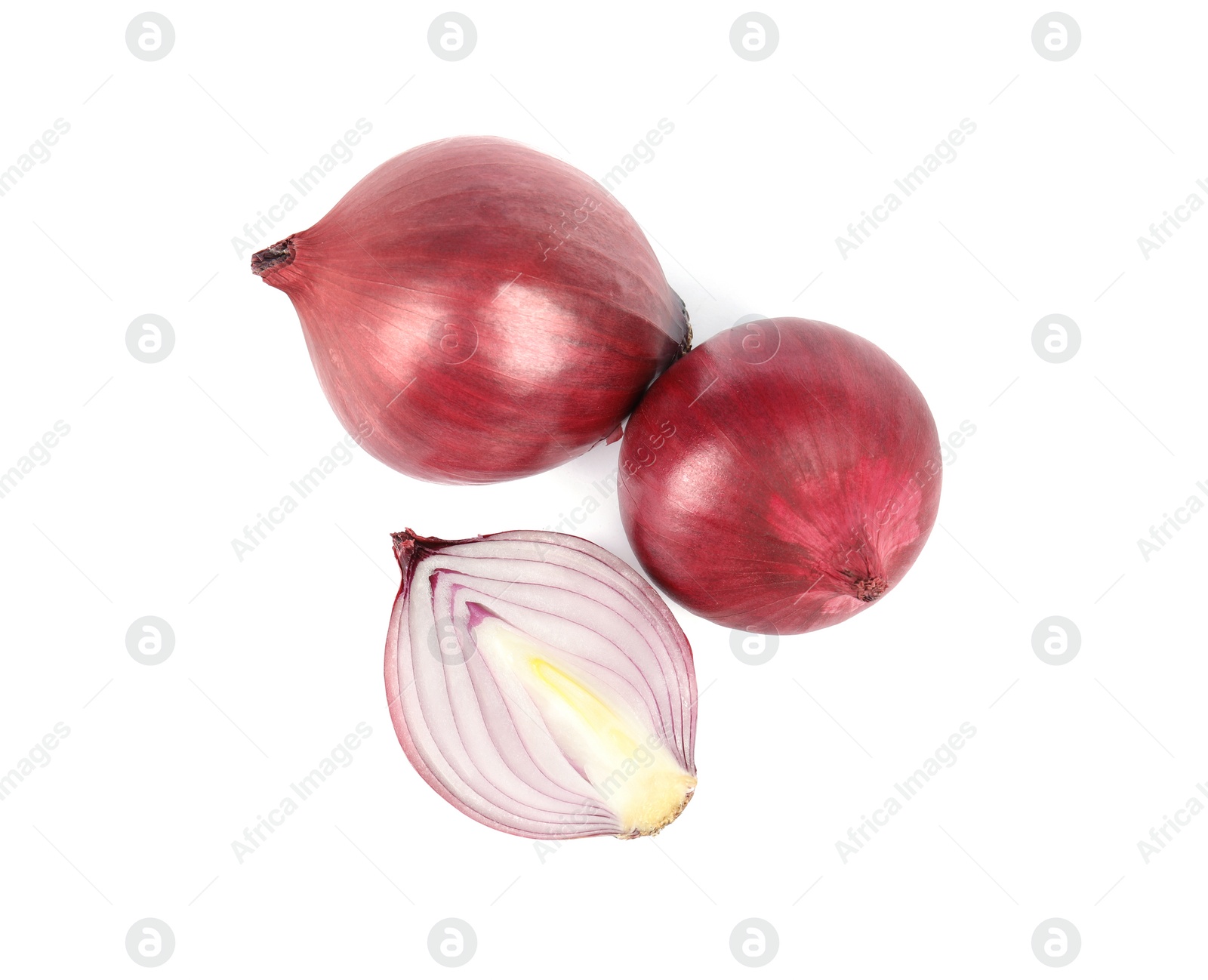 Photo of Fresh whole and cut red onions on white background, top view