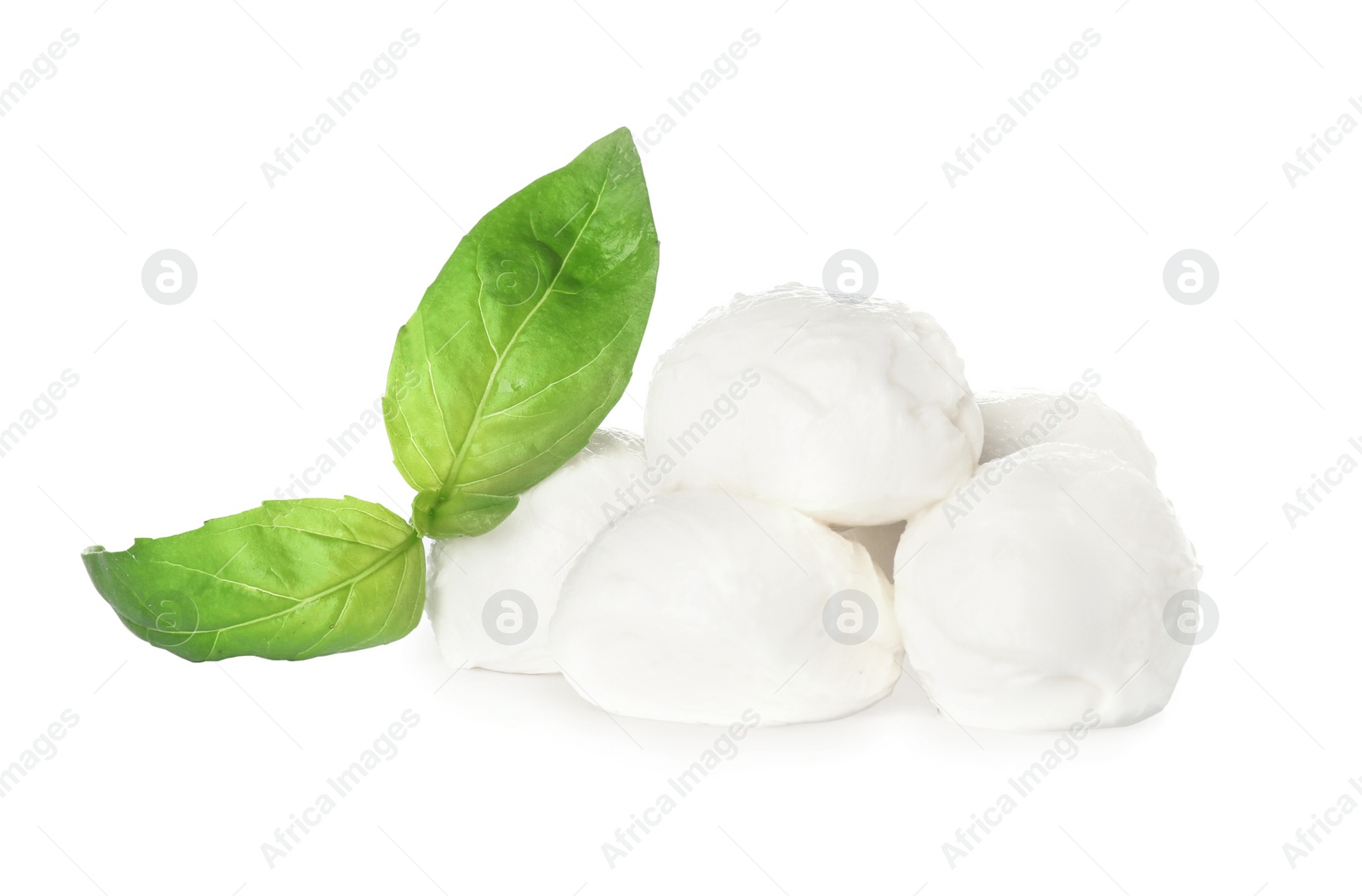 Photo of Delicious mozzarella cheese balls and basil on white background