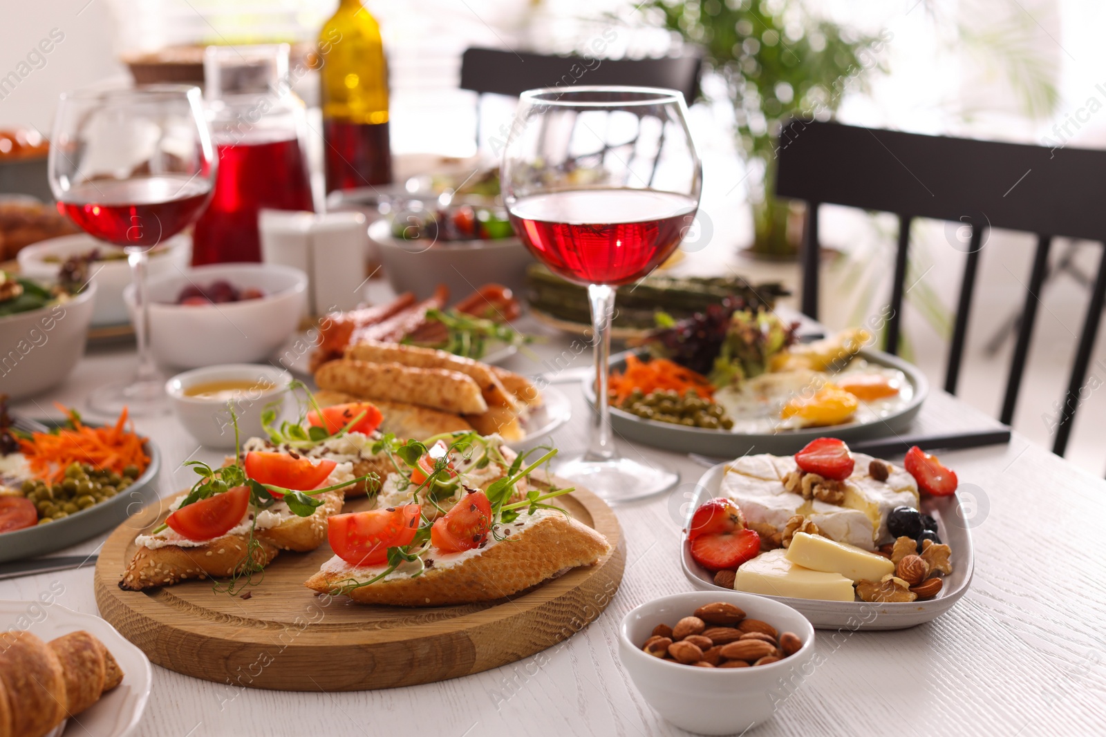 Photo of Many different dishes served on buffet table for brunch