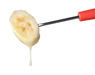 Photo of Banana with chocolate on fondue fork against white background