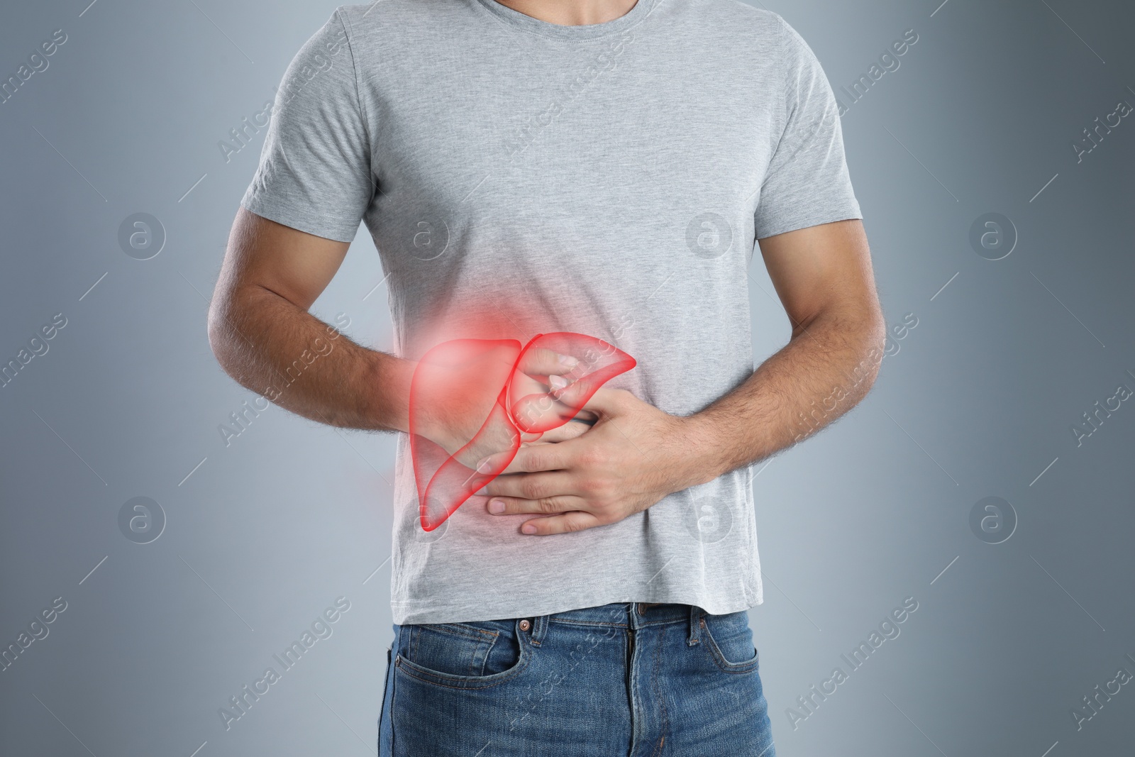 Image of Man suffering from liver pain on grey background, closeup
