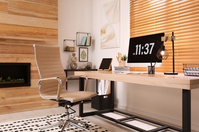 Photo of Room interior with comfortable workplace. Modern computer on wooden desk