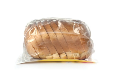 Photo of Sliced loaf of wheat bread in plastic bag isolated on white