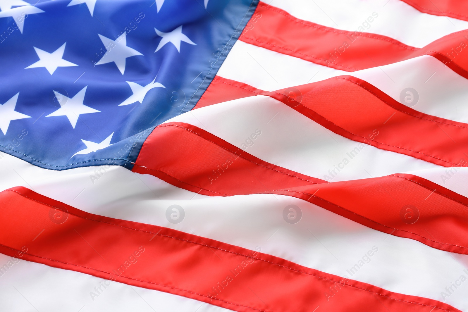 Photo of American flag as background, closeup. National symbol