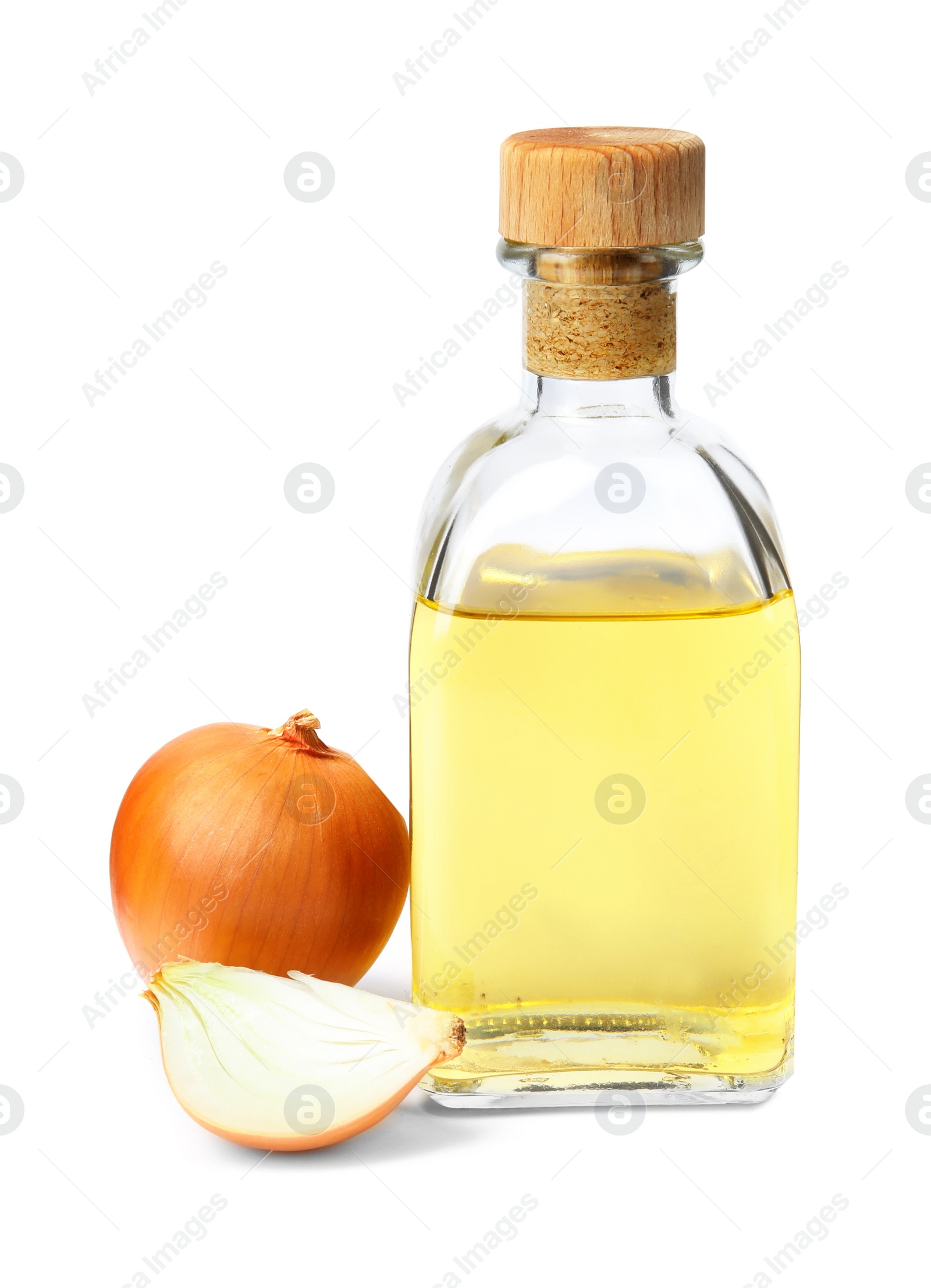 Photo of Glass bottle of onion syrup and fresh ingredient on white background