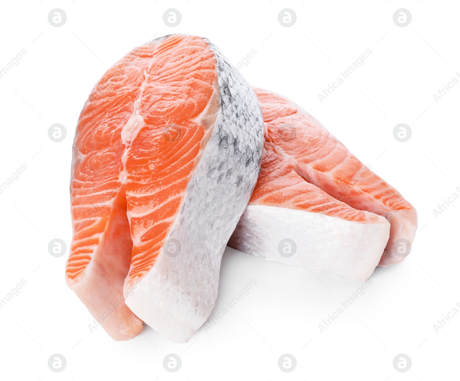 Photo of Fresh raw salmon steaks on white background