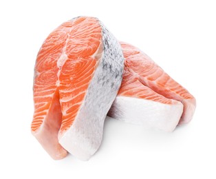 Photo of Fresh raw salmon steaks on white background