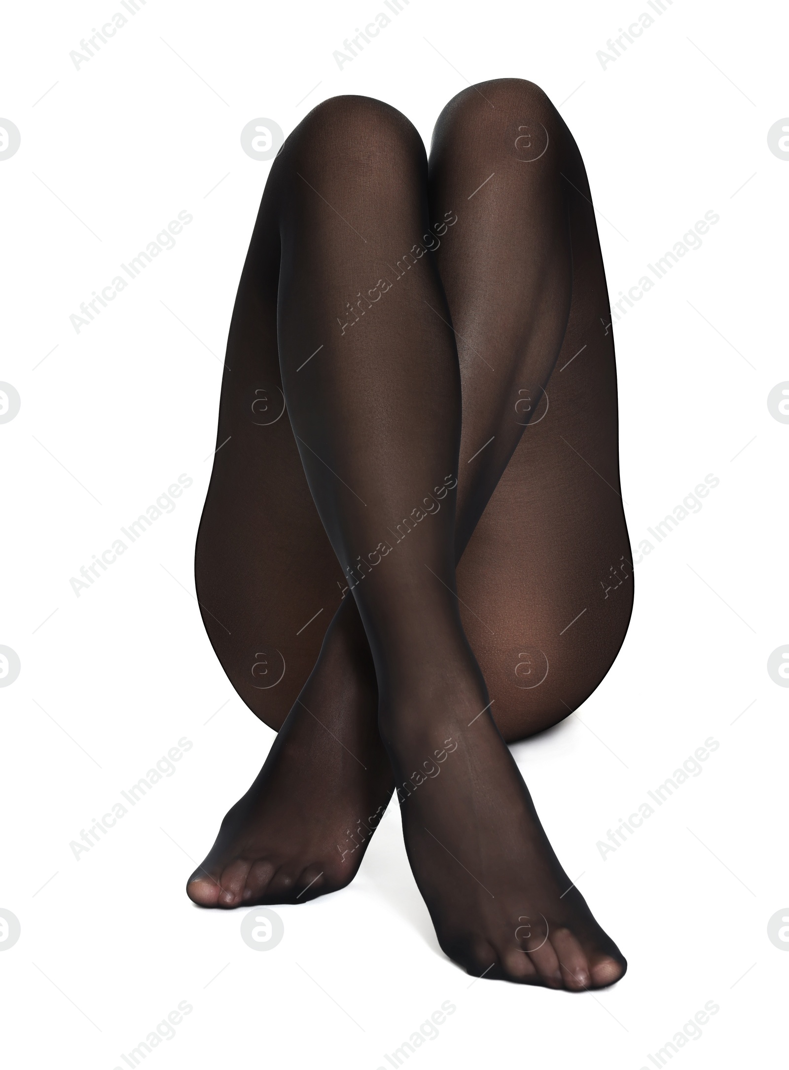 Photo of Woman with beautiful long legs wearing black tights on white background