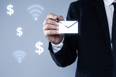 Electronic mail. Businessman and virtual screen with different icons, closeup