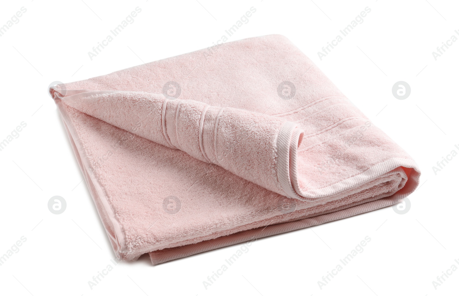 Photo of Folded soft terry towel on white background