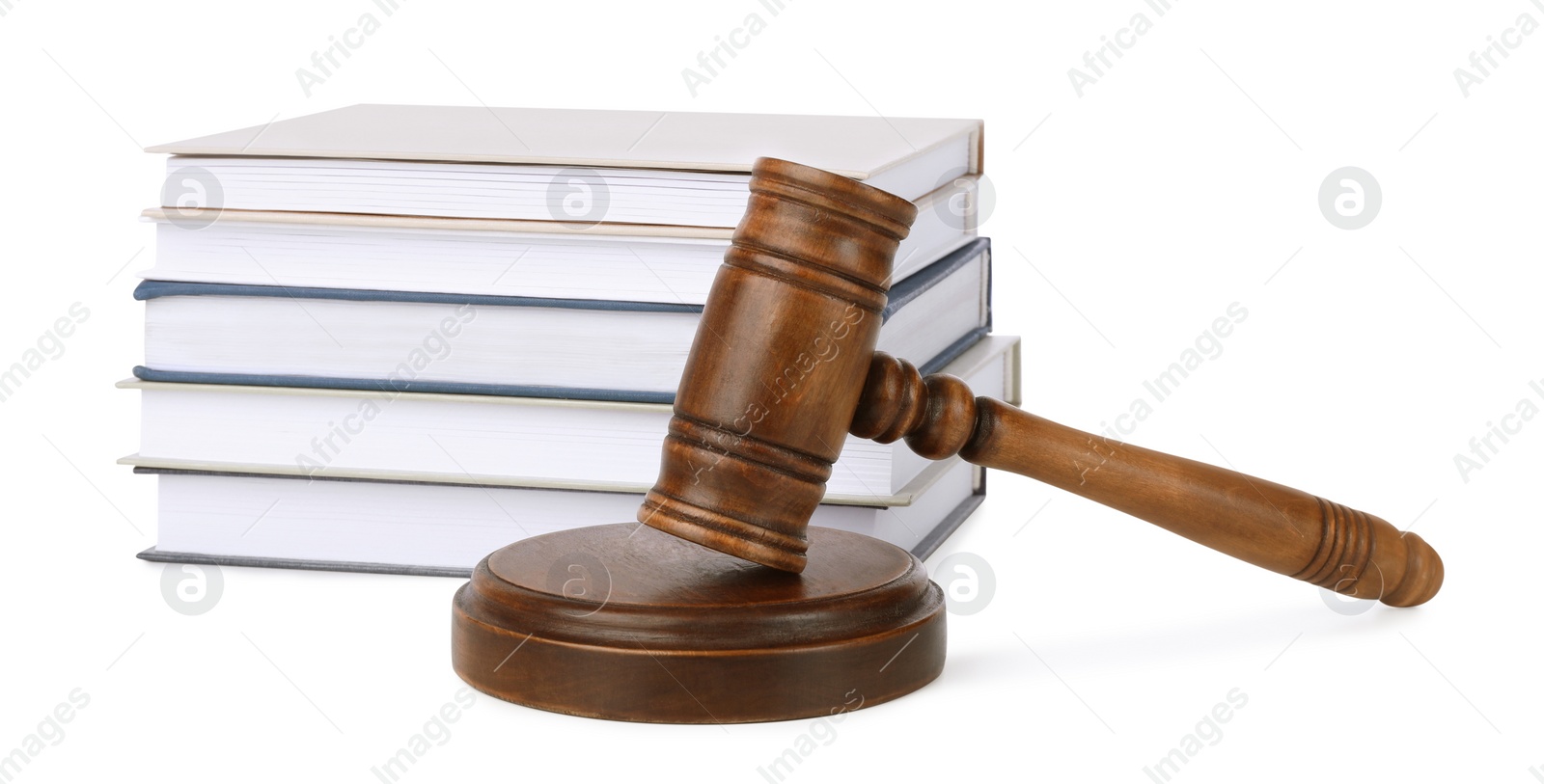 Photo of Wooden gavel and stack of books on white background