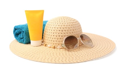 Photo of Straw hat, sunscreen, towel and sunglasses isolated on white. Beach objects