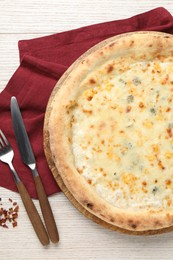 Photo of Delicious cheese pizza served on white wooden table, flat lay