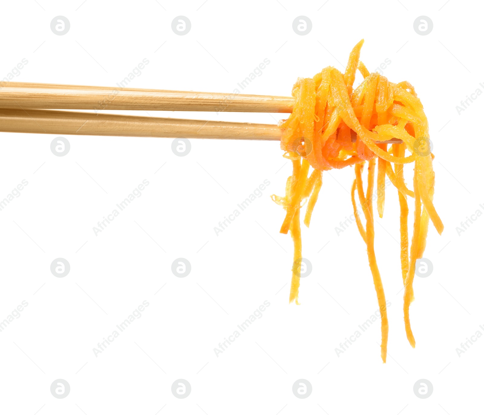 Photo of Chopsticks with delicious Korean carrot salad on white background