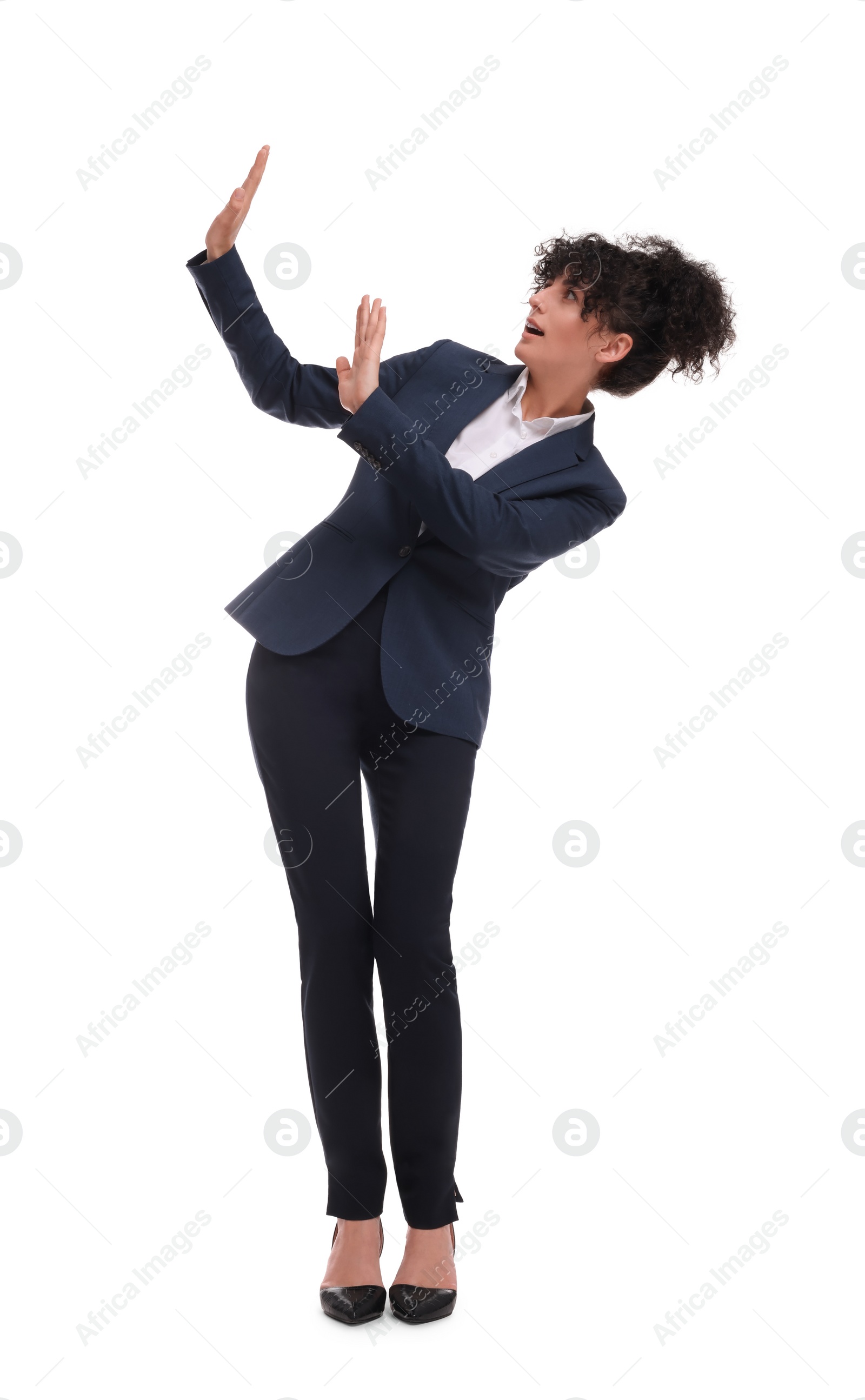 Photo of Beautiful young businesswoman in suit on white background