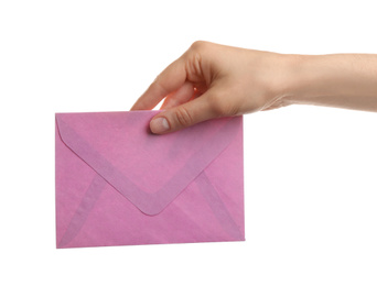 Woman holding pink paper envelope on white background, closeup