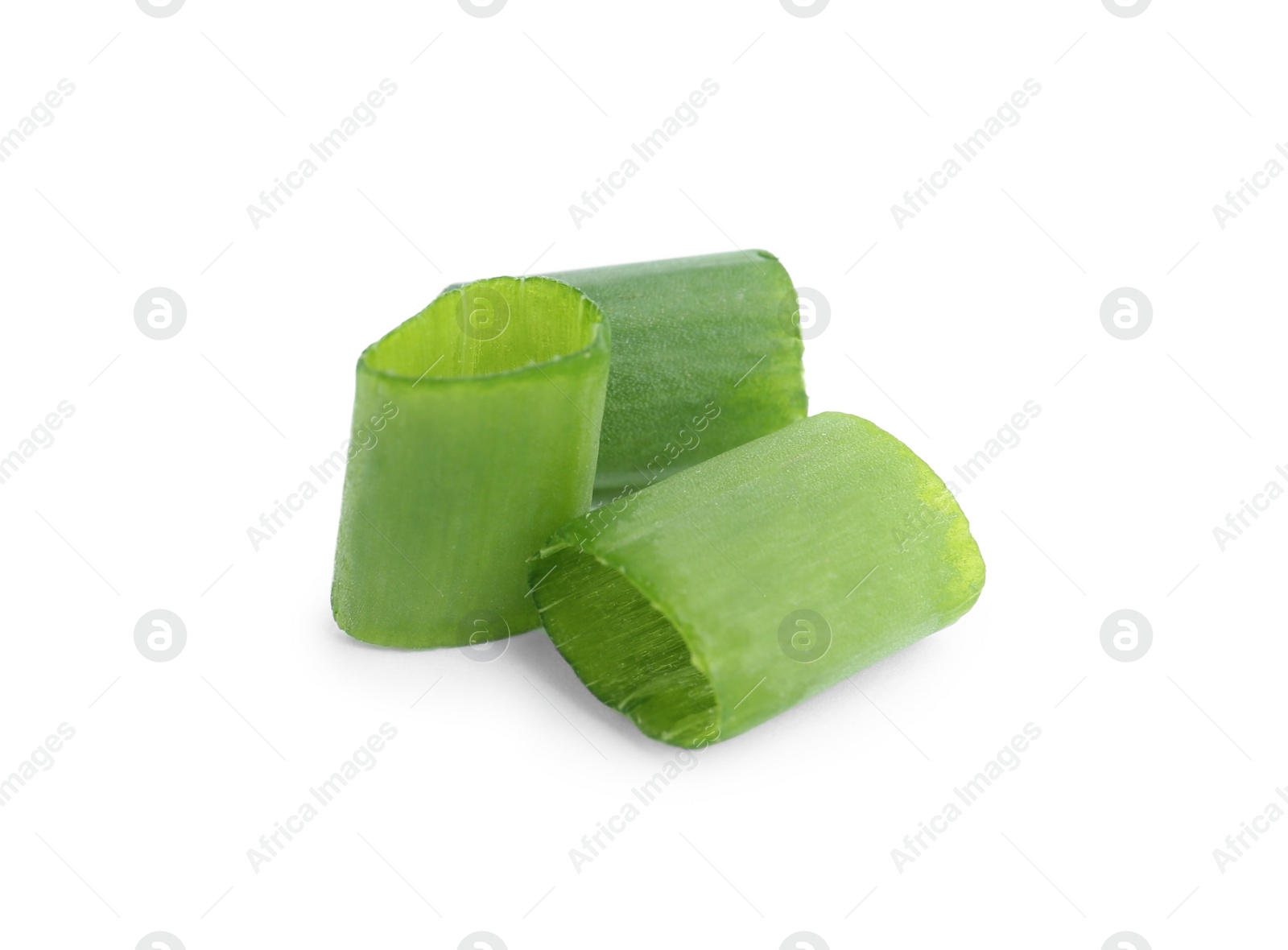 Photo of Pieces of green spring onion isolated on white