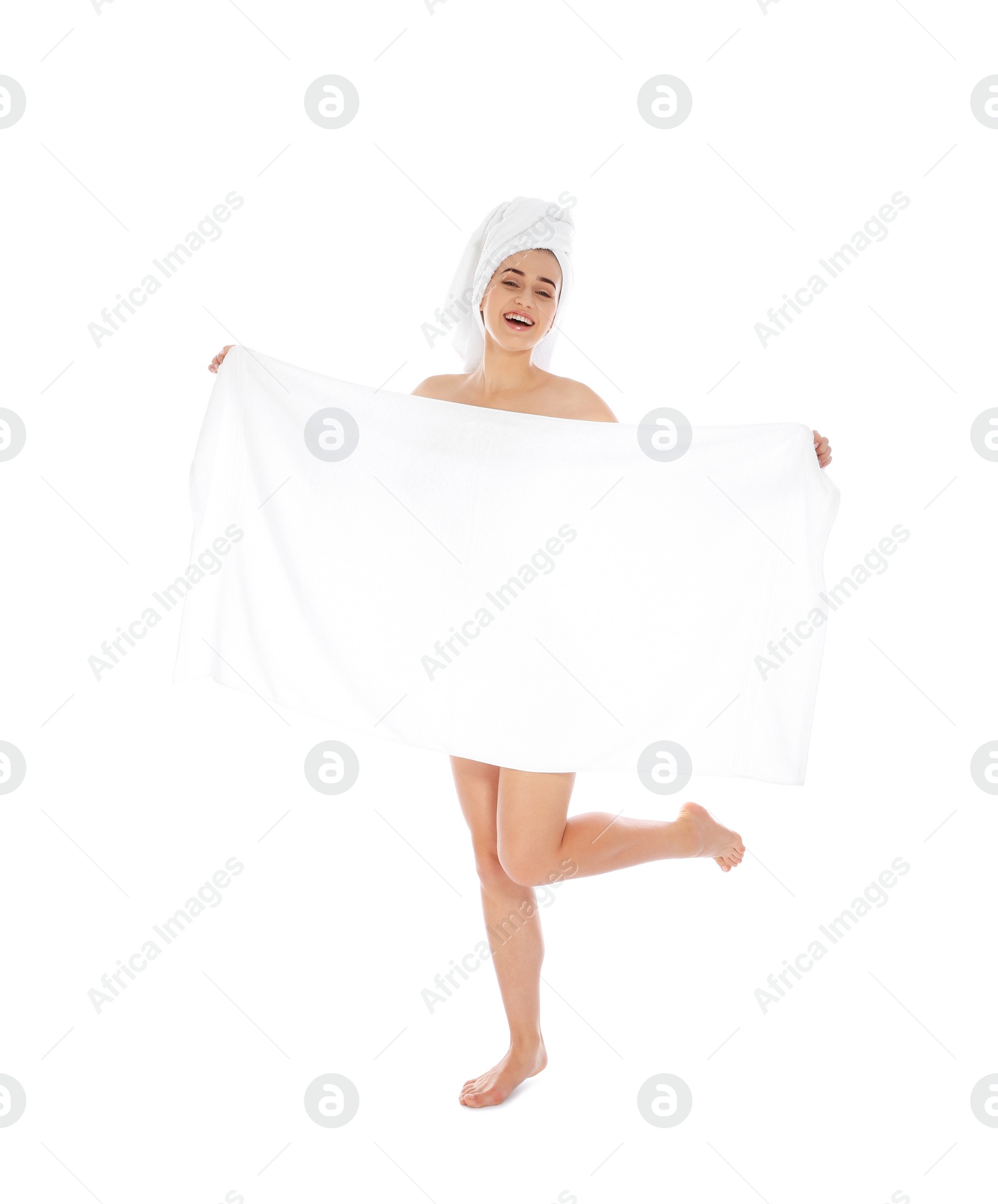 Photo of Full length portrait of young pretty woman with towels on white background