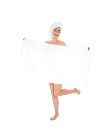 Full length portrait of young pretty woman with towels on white background