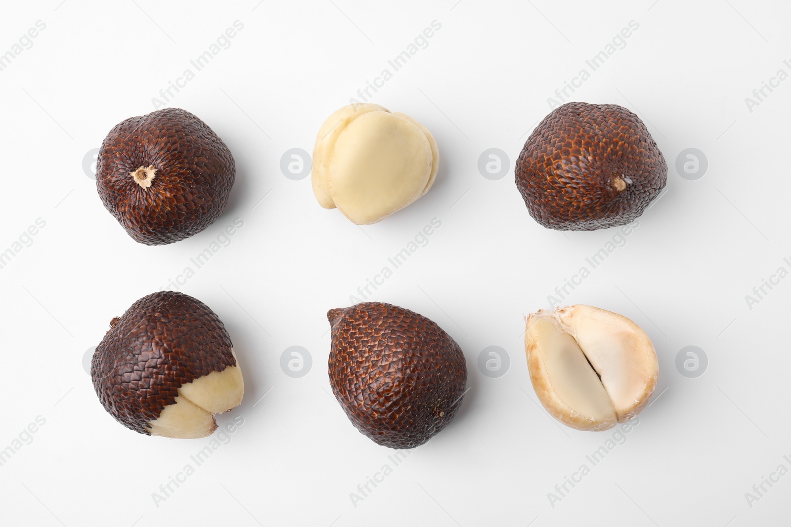 Photo of Fresh salak fruits on white background, flat lay