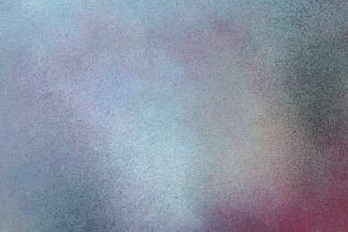 Photo of Texture of abstract spray paint as background, top view