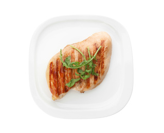 Photo of Tasty grilled chicken fillet with arugula isolated on white, top view